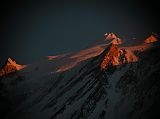 Manaslu 09 11 Manaslu Summit Plateau Close Up At Sunset From Bimtang Here�s another extremely close up view from Bimtang at sunset of the summit plateau of Manaslu with the East Pinnacle (7992m) on the left and the summit to the right.